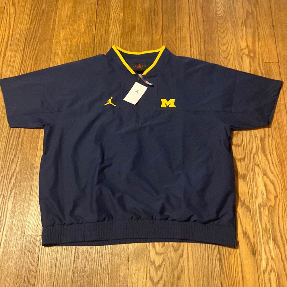 Jordan Brand Michigan Wolverines Football Team issue coaching jacket.